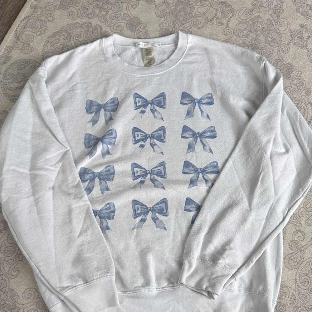 Altar’d state White Sweatshirt with Blue Bow Print -